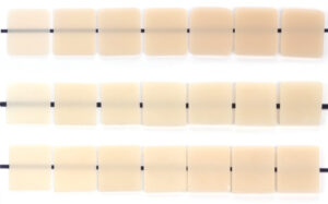  Tiles of various ceramic materials (top to bottom: lithium disilicate, 4Y zirconia, 3Y zirconia) at different thicknesses (left to right: 0.5mm, 0.8mm, 1mm, 1.2mm, 1.5mm, 1.8mm, 2mm).
