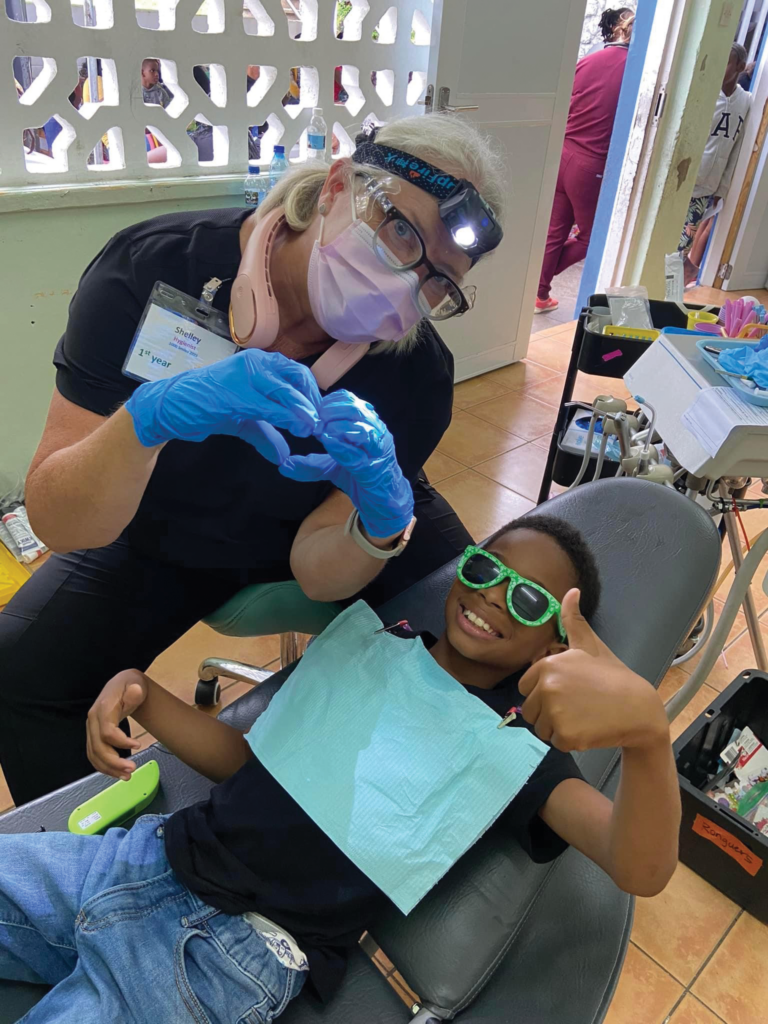 Hygienist Shelley Getty and happy patient Michael at Seal Grenada.
